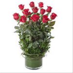 Arrangement of 12 Long Stemmed Red Roses in a Low Glass Vase