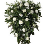 Funeral spray with mixed white cut flowers